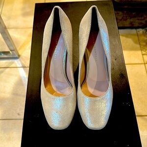 Elegant silver pumps size 8.5.